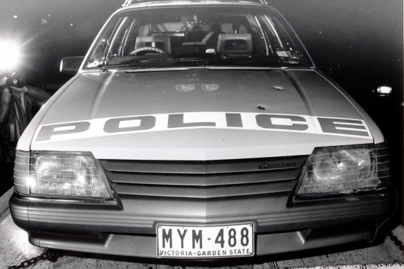 A police car showing bullet holes from the shooting in Noble Park.
