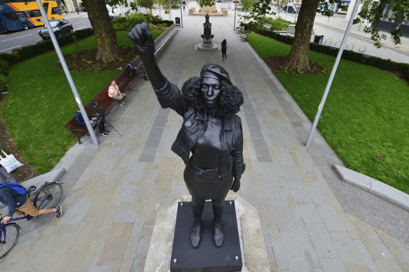 A new black resin and steel statue entitled "A Surge of Power (Jen Reid) 2020" by artist Marc Quinn was put on the empty plinth of the toppled statue of 17th century slave trader Edward Colston.
