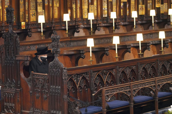 This image of the Queen sitting alone in St George’s Chapel ahead of the funeral for Prince Philip touched hearts around the world, after a year of deaths made lonely by the pandemic’s social isolation. 