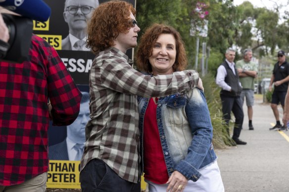 Belyea casting her vote with son Flynn on Saturday.