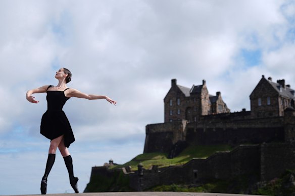 Scottish Ballet principal Roseanna Leney poses as Mary, Queen of Scots, on the roof of Saltire Court overlooking Edinburgh Castle, Scotland, ahead of the Edinburgh International Festival.