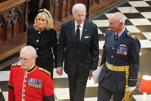 US President Joe Biden (centre) and first lady Jill Biden arrive at the state funeral for Queen Elizabeth II in Lo<em></em>ndon on Monday.