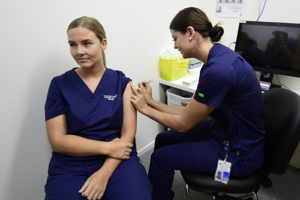 Registered nurse Rebecca DeJong received a COVID-19 vaccination at Townsville University Hospital last month.