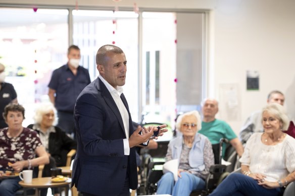 TLC Healthcare chief Lou Pascuzzi talks with residents from Geelong’s Warralily Gardens aged care last week.