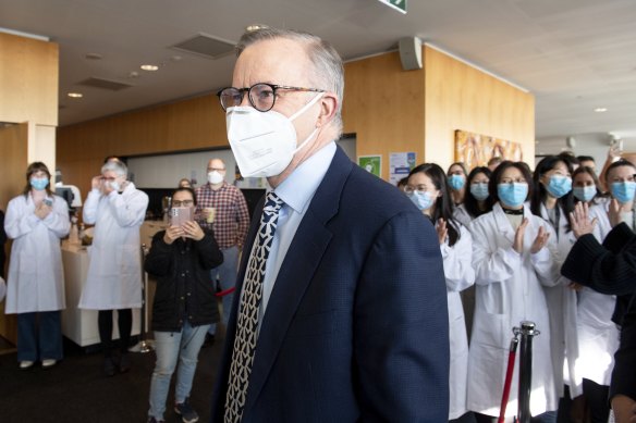 Anthony Albanese and Mark Butler wore masks when not speaking at their press conference in Melbourne. 