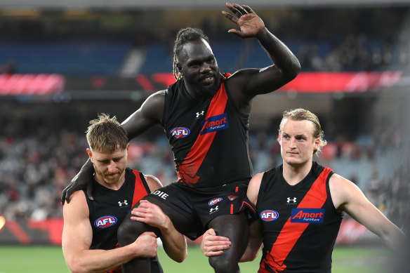 McDonald-Tipungwuti was chaired off by Dyson Heppell and Mason Redman after the last of his 133 Essendon games.