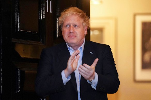 Prime Minister Boris Johnson claps outside 11 Downing Street to salute local heroes during last week's nationwide Clap for Carers NHS initiative. Johnson has been living at No 11 in isolation after being diagnosed with COVID-19.