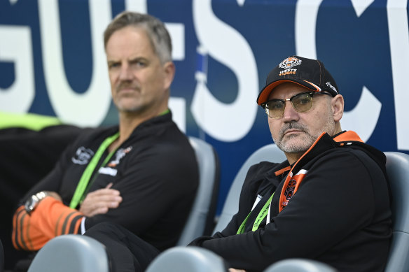 Tigers CEO Justin Pascoe and chairman Lee Hagipantelis look on during the 74-0 flogging in North Queensland.