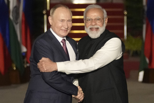 Vladimir Putin with Narendra Modi. Amid neutrality on Ukraine, India has increased oil imports from Russia.