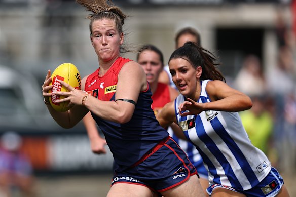 Eden Zanker is tackled by Erika O’Shea of the Kangaroos during the AFLW preliminary final.