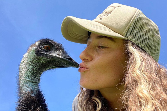 Taylor Blake and Emmanuel the emu.