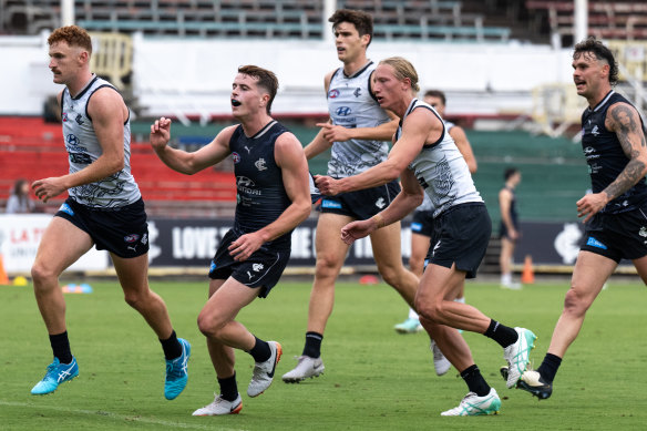 Jagga Smith raises his fist in celebration at Carlton training.