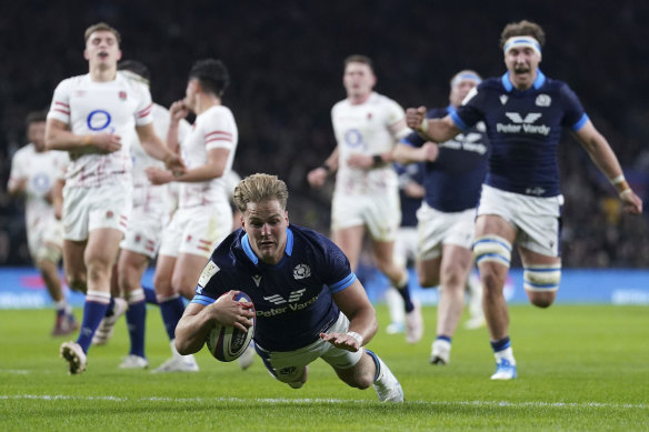 Duhan van der Merwe crosses the line for Scotland at Twickenham.