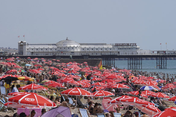 There was little room to move on Brighton Beach as people tried to find some relief from the scorching heat in England.