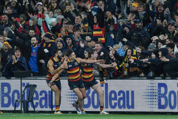 Ben Keays celebrating what he thought was a goal, before it was called as a behind.