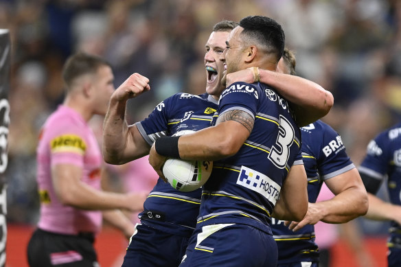 Valentine Holmes celebrates a try.