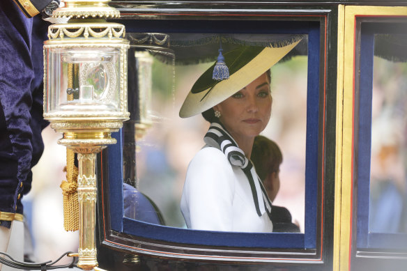 Catherine, Princess of Wales, travels along The Mall to the Trooping the Colour ceremony at Horse Guards Parade, in London.