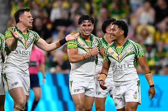 Rua Ngatikaura celebrates his try for the Cook Islands.
