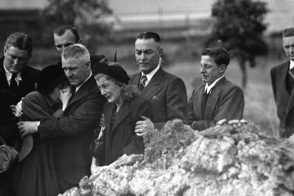 ‘Chow’ Hayes, centre, at the funeral of his nephew Danny Simmons on May 4, 1951.