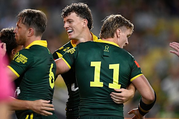 Jack Bostock celebrate scoring Australia’s opening try.