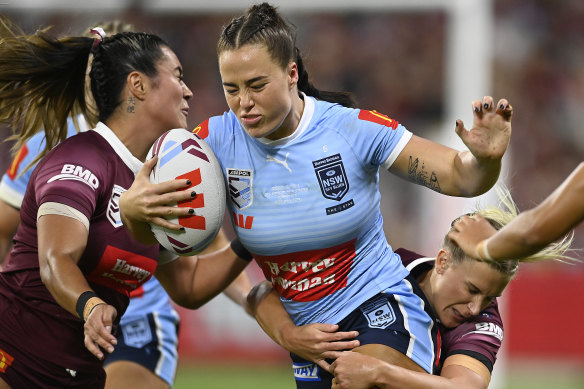 Isabelle Kelly takes on the Maroons defence in the 2023 series.