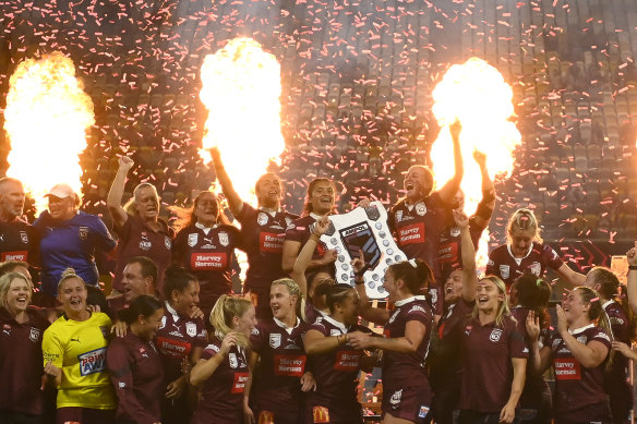 Queensland’s players celebrate after clinching the two-game Origin series in 2023.