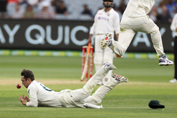Travis Head drops a catch off India's Ajinkya Rahane on day two.