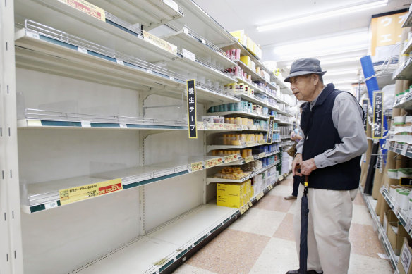 Empty shelves at a DIY shop in Yokohama on Friday after residents had started preparing for the worst.