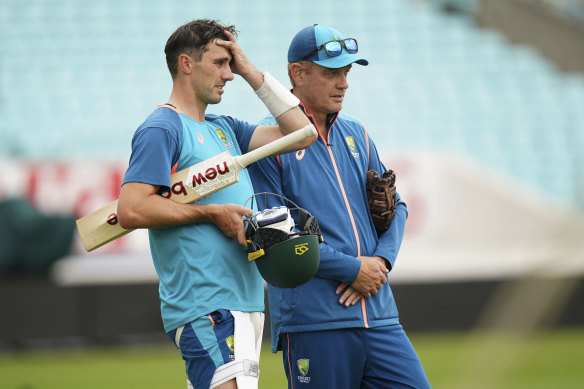 Pat Cummins (left) and coach Andrew McDonald during a training session on Tuesday.