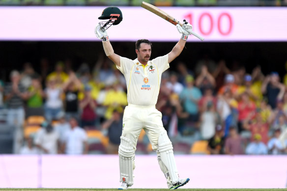 Travis Head rejoices in his century.