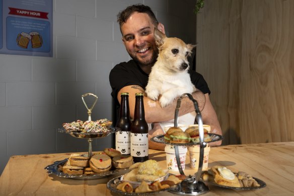 Brent Martin and Penny, 8, and some of the treats made by small Melbourne brands.