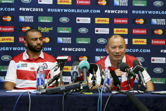 Eddie Jones and Japan’s captain Michael Leitch in 2015 after beating the Springboks in the Rugby World Cup.
