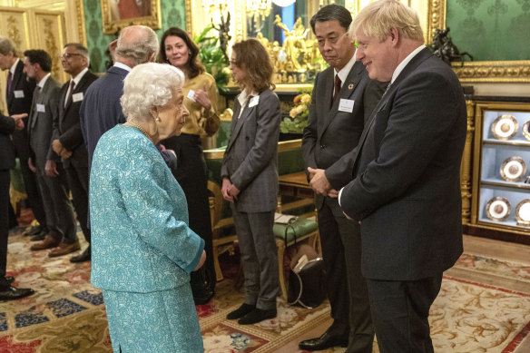 The Queen had an online meeting last week with British Prime Minister Boris Johnson, seen here at a Windsor Castle reception last October, but cancelled most other appointments. 
