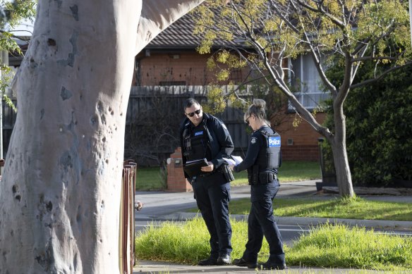 Homicide squad detectives at the scene of the attack in Bailey Street, St Albans. 
