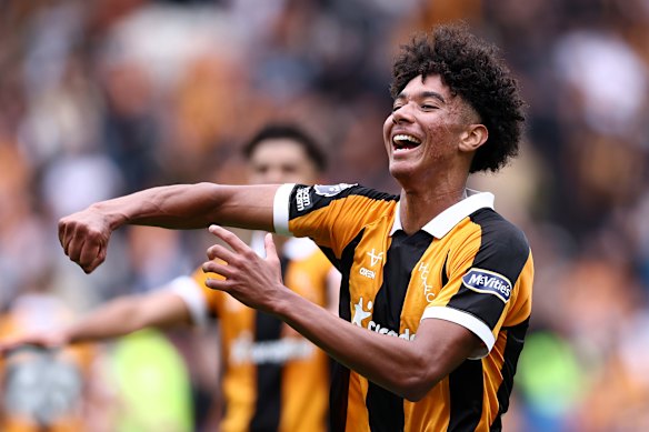 Lucas Herrington celebrates Hull’s win over Manchester United..