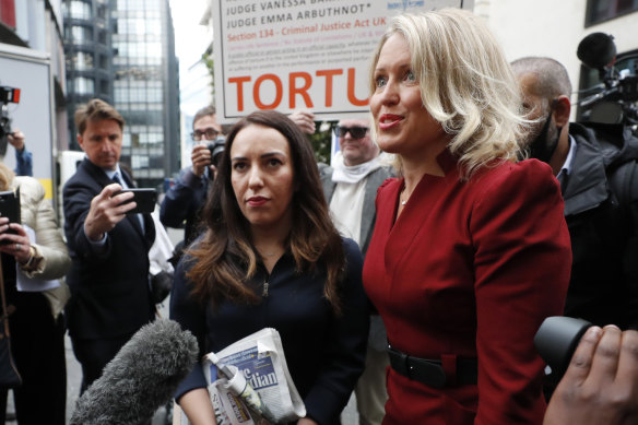 Julian Assange's girlfriend Stella Morris, left, and his lawyer Jennifer Robinson arrive at the court on Monday,