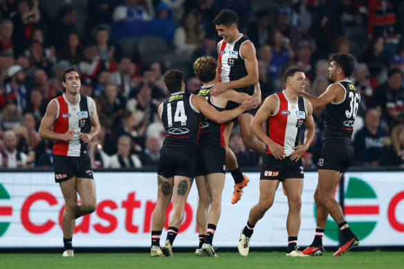 Angus Hastie of the Saints celebrates his first AFL goal.