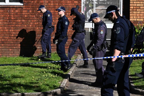 Police on Monday investigate outside a unit block in Erskineville, following the death of a man in an alleged assault on Sunday night.