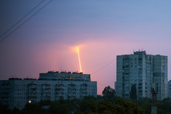 A Russian rocket launched toward Ukraine from Russia’s Belgorod region is seen at dawn in Kharkiv, Ukraine.