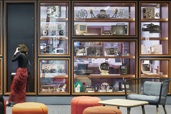The Digital Preservation Lab is visible to visitors to ACMI through the window displays in Edie Kurzer’s Wall of Objects.