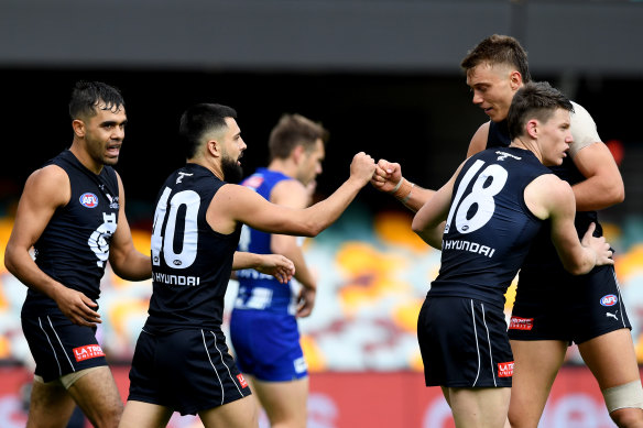 Carlton's Michael Gibbons celebrates a goal during round eight against North Melbourne. 