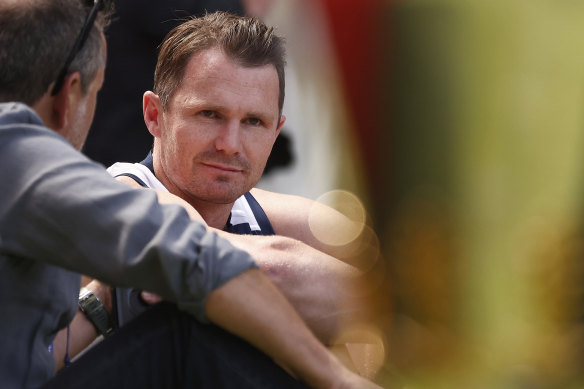 Patrick Dangerfield with the lure of the AFL premiership cup in the foreground.