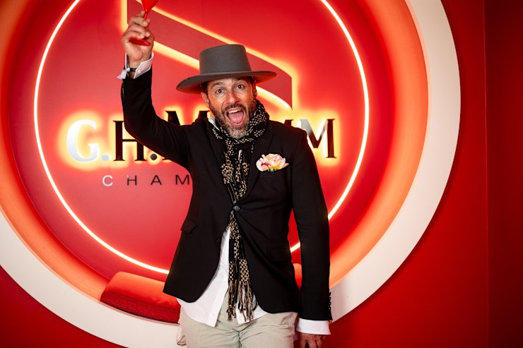 Alex‍ Dimitriades wearing his grey fedora