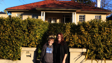Lochie Maher with his mum Fiona in front of their house on Cliff Rd,  Epping, NSW. They cashed in on the 2016 property boom by selling their house to a developer.