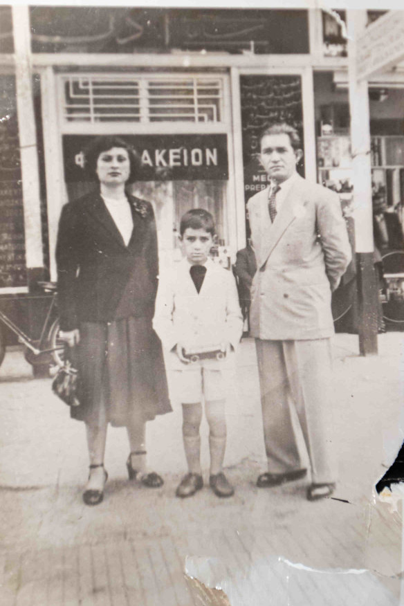 Nick Politis as a child with his parents en route to Australia.