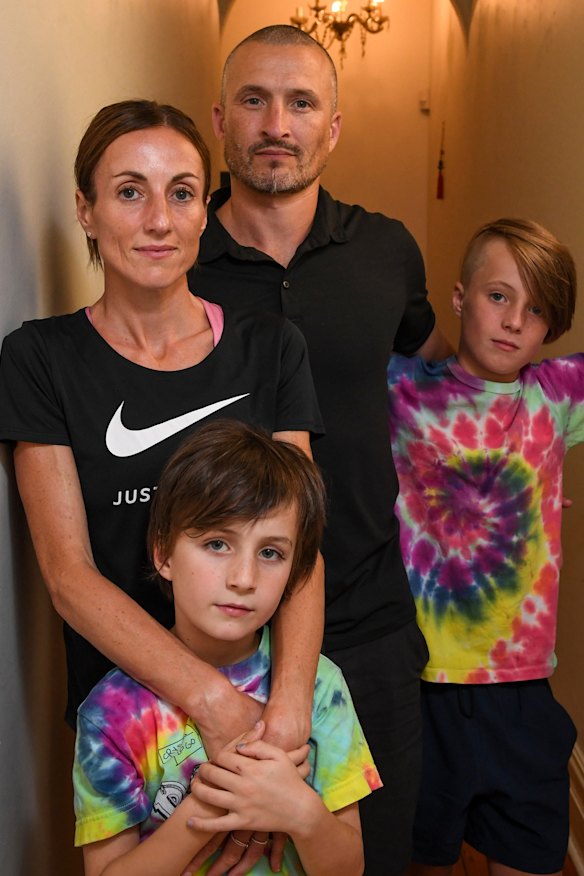Marathon runner Sinead Diver at her Melbourne home with husband Colin, and sons Eddie, 11, and Dara, 7.