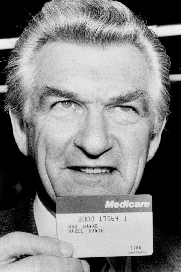 Bob Hawke with the first Medicare card.