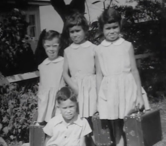 Rhoda (middle) with her twin sister, Lois (at right), their brother Mark (front) and a neighbour, Ann, in 1966. 