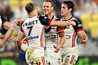 Daly Cherry-Evans celebrates with Sam Walker and Nat Butcher.