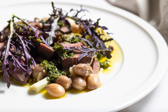 A robust salad of artichokes, borlotti beans, ox heart and salsa verde.